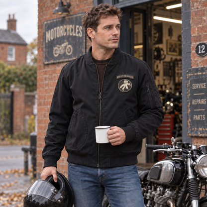 Men’s Whitfield Cotton Flight Bomber Jacket worn beside a parked motorcycle in Britain